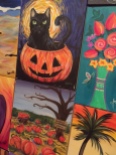 black cat in pumpkin